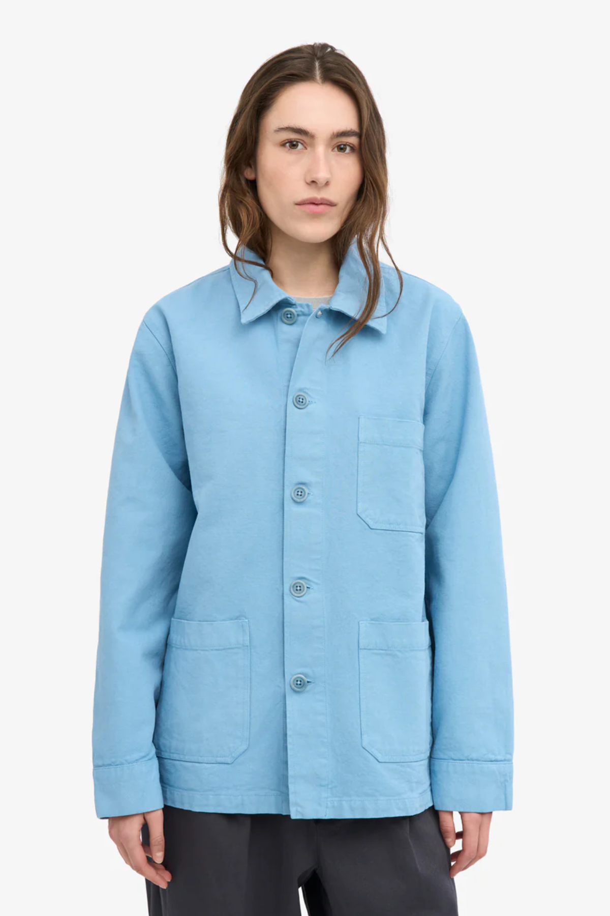 Light blue unisex organic cotton worker jacket with button front and pocket detail