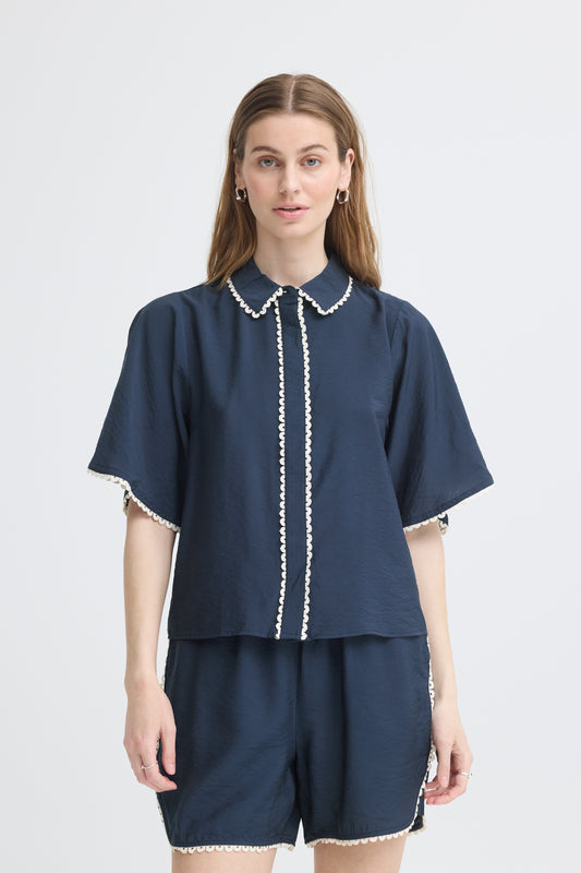 Lightweight navy short sleeve shirts with cream contrast trim in a boxy fit