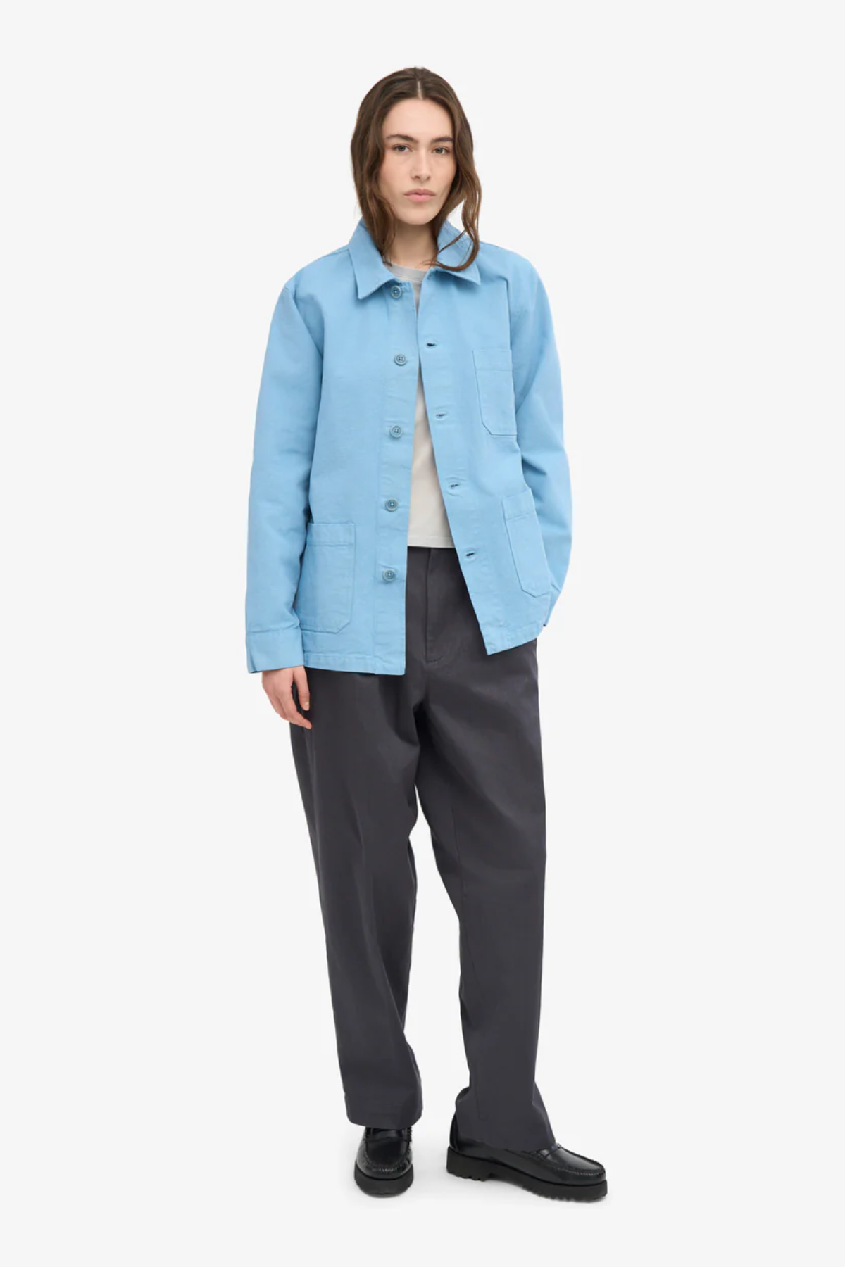 Light blue unisex organic cotton worker jacket with button front and pocket detail