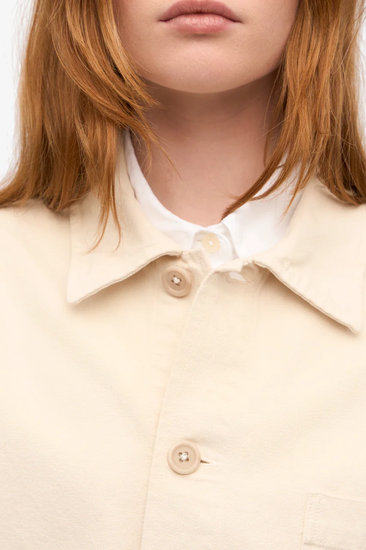 Ivory unisex organic cotton worker jacket with button front and pocket detail