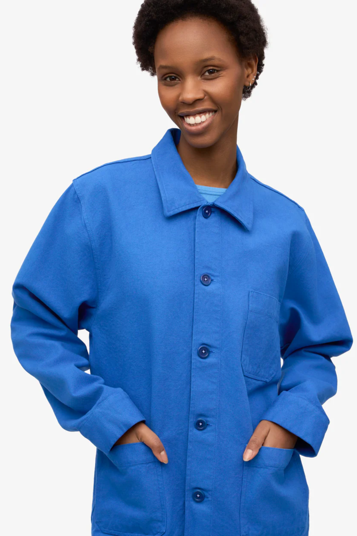 Royal blue unisex organic cotton worker jacket with button front and pocket detail