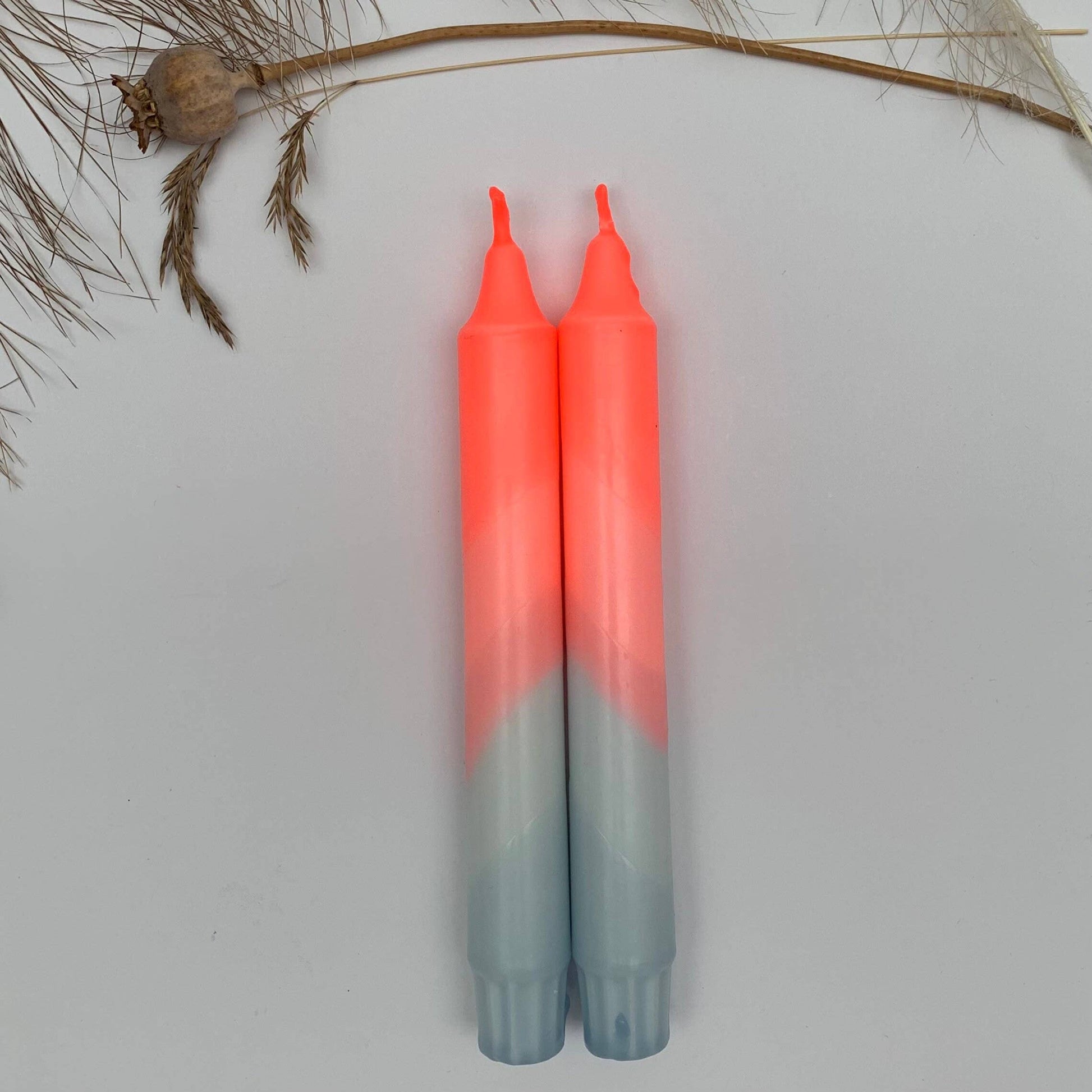 The Singing Rabbit - Neon Coral & Dawn Blue Swirl Dip Dyed Dinner Candles