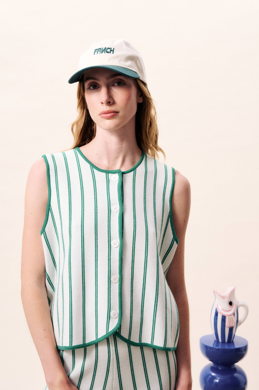white knitted button-front waistcoat with bright green pinstripes and green border