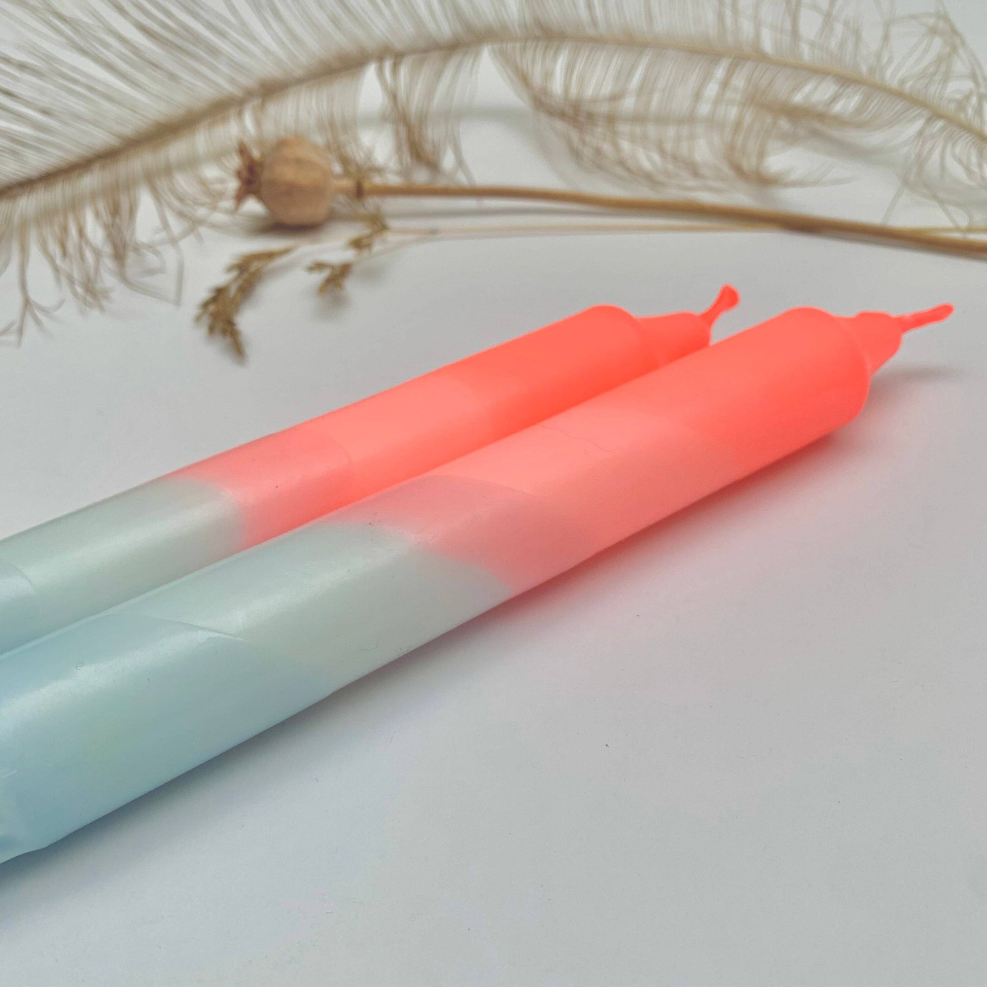 The Singing Rabbit - Neon Coral & Dawn Blue Swirl Dip Dyed Dinner Candles