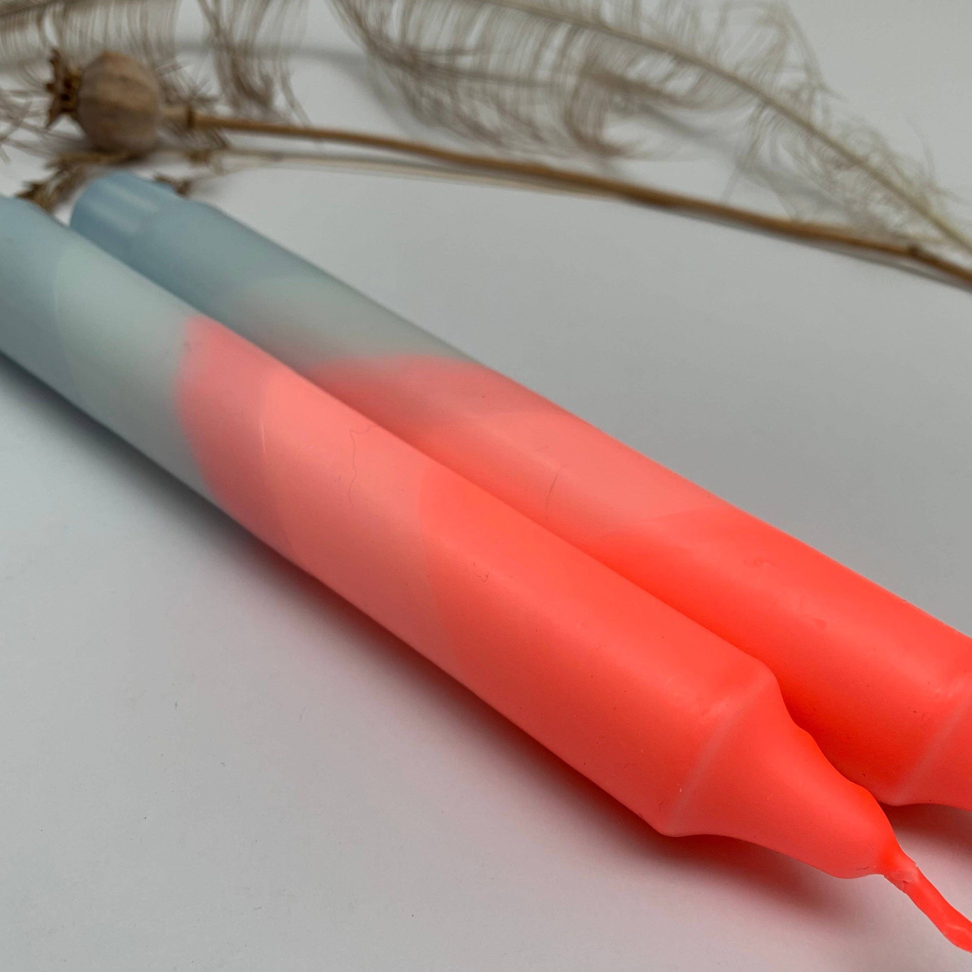 The Singing Rabbit - Neon Coral & Dawn Blue Swirl Dip Dyed Dinner Candles