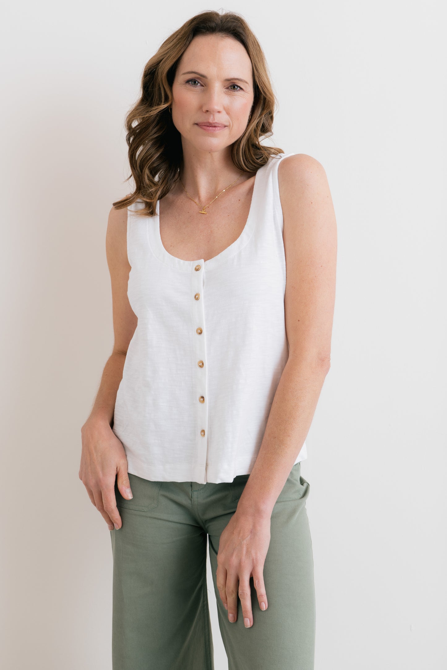 Lightweight cotton round-neck white vest with button-down front