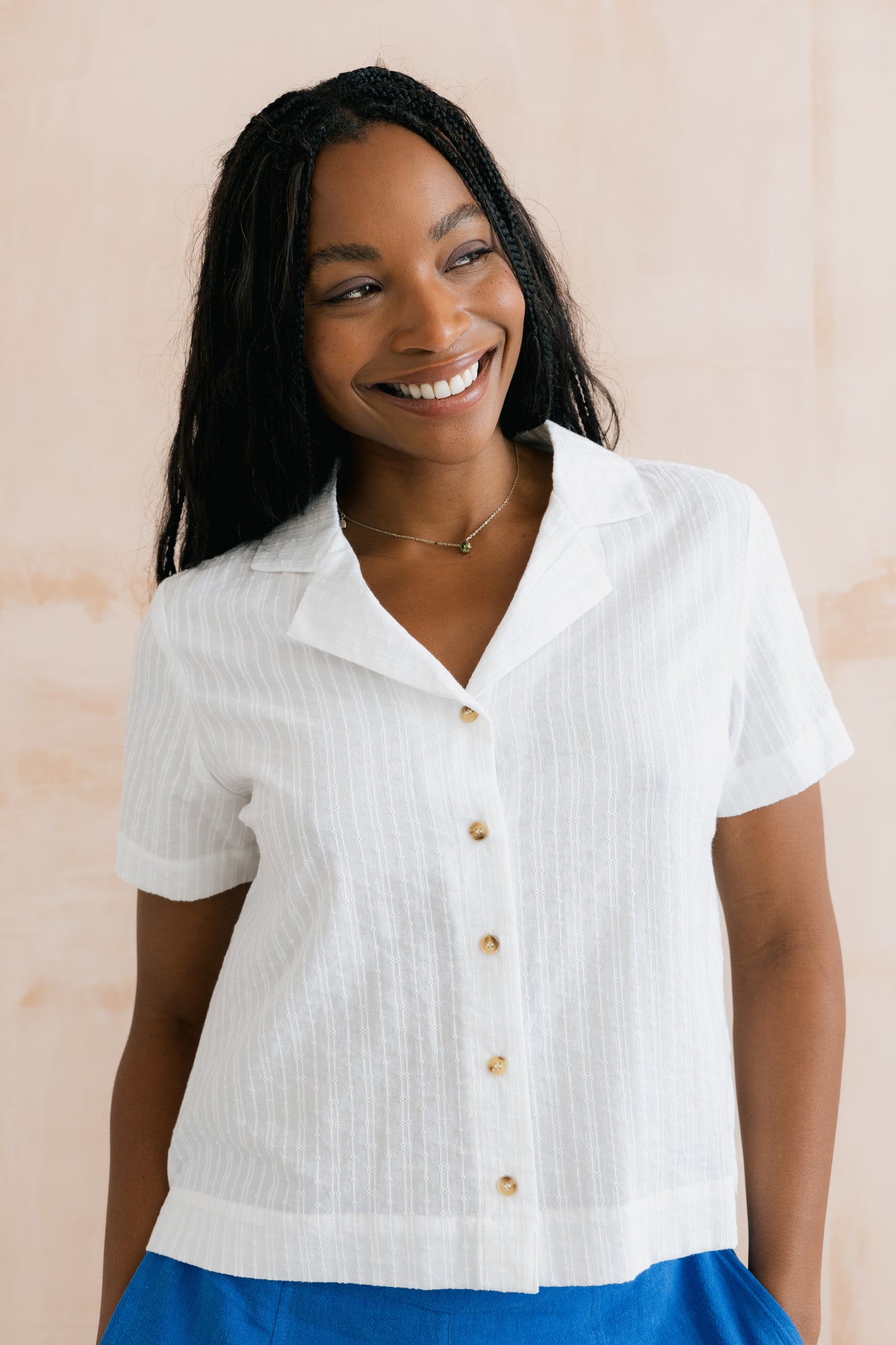 white organic dobby cotton shirt with vintage collar shape and button-down front