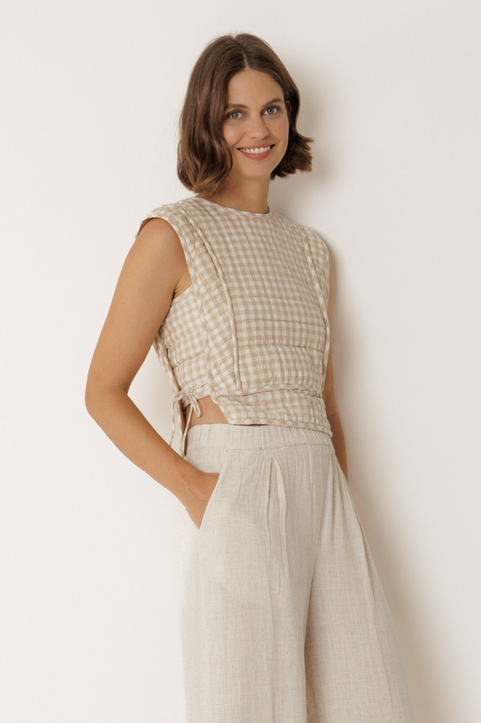 Lightly quilted gingham top with adjustable side tie detail