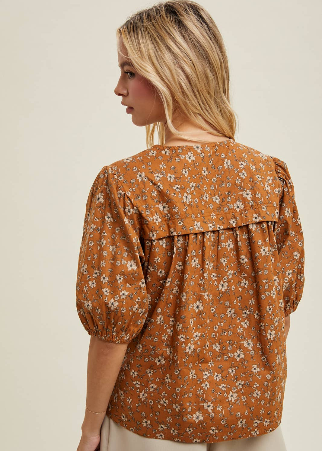 Floral Button-Up Blouse. brown