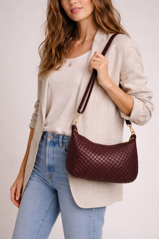 Bordeaux coloured women's woven leather handbag