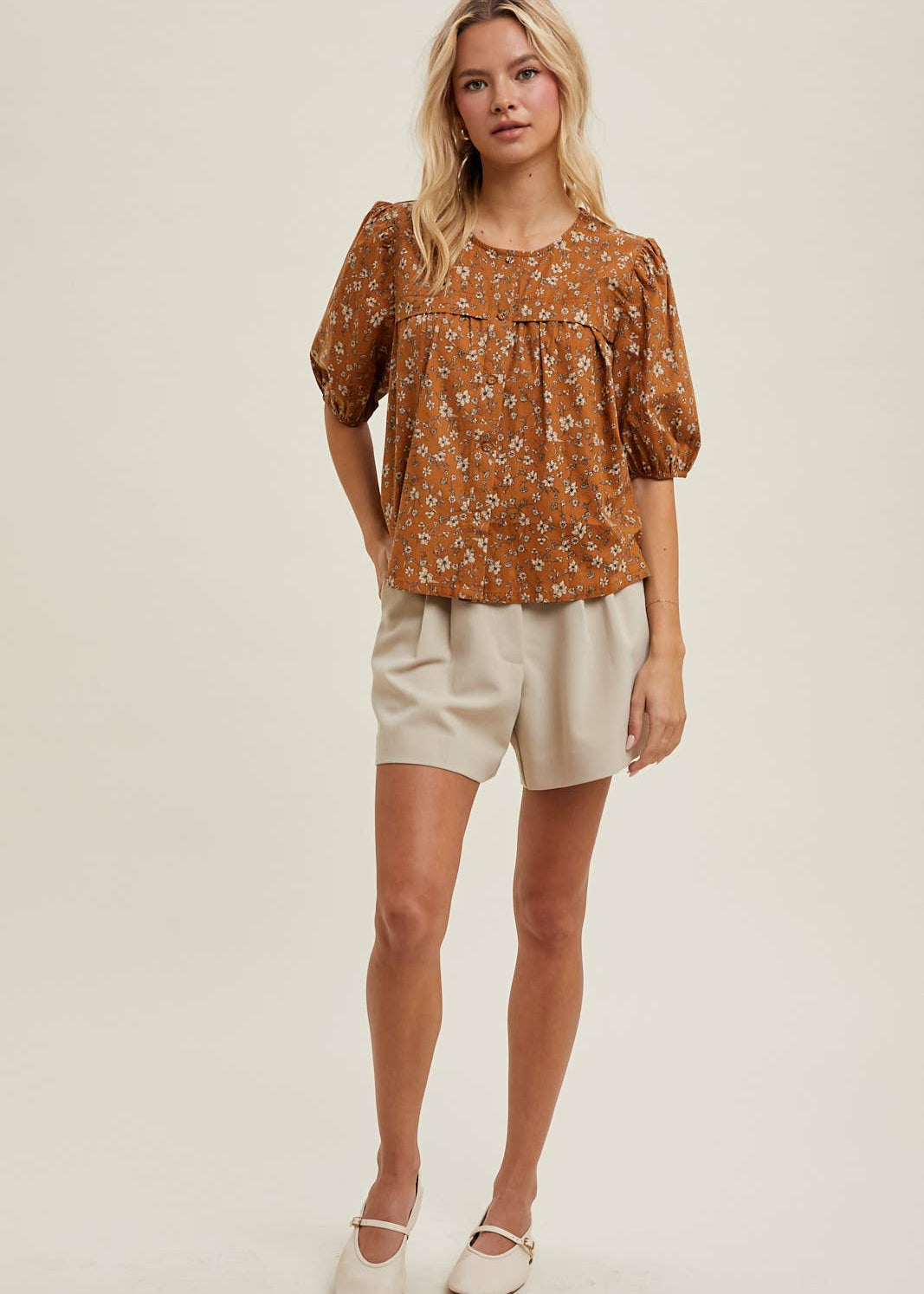 Floral Button-Up Blouse. brown