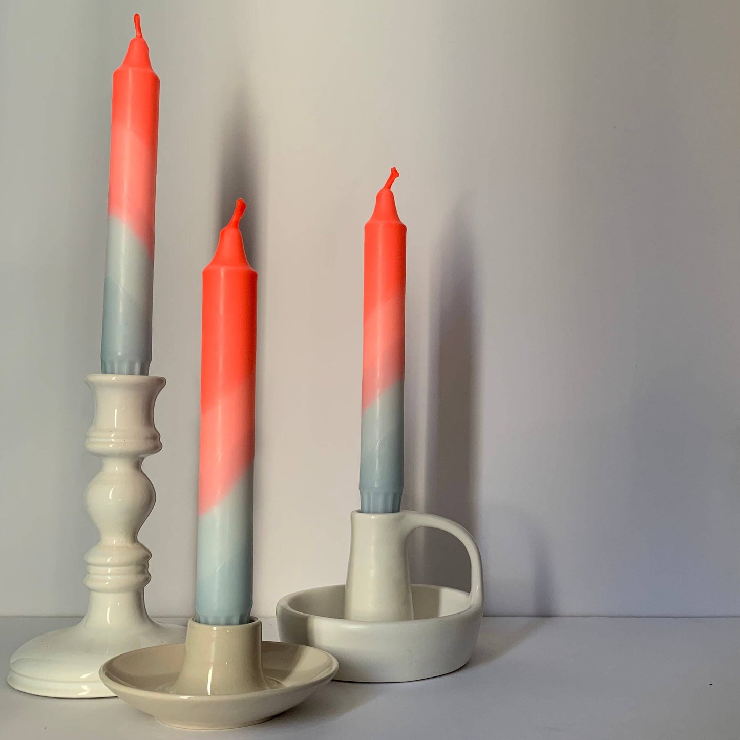 The Singing Rabbit - Neon Coral & Dawn Blue Swirl Dip Dyed Dinner Candles